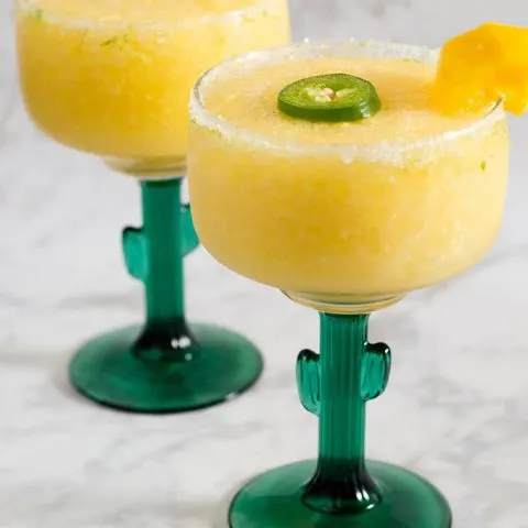 Get a Taste of Adventure with frozen mango jalapeno margaritas! Blend Nature’s Touch organic mango with jalapeno-infused tequila, triple sec and lime juice. #FlavorAdventure #ad