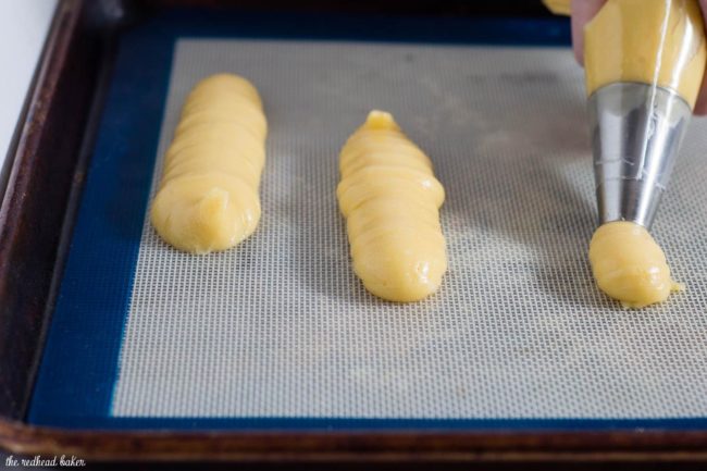 Hop into spring with strawberry-lemon eclairs, filled with fruit-flavored pastry cream then dipped in white chocolate ganache. #ad