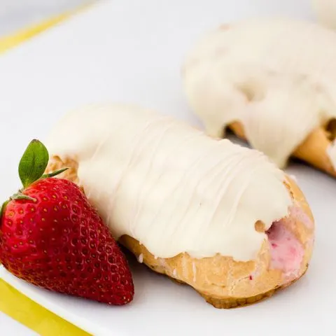 Hop into spring with strawberry-lemon eclairs, filled with fruit-flavored pastry cream then dipped in white chocolate ganache. #ad