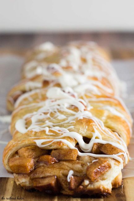 An apple Danish braid is a delicious fruit-filled pastry to serve at brunch. Flaky pastry covers sauteed cinnamon apples and sweetened cream cheese. #BrunchWeek