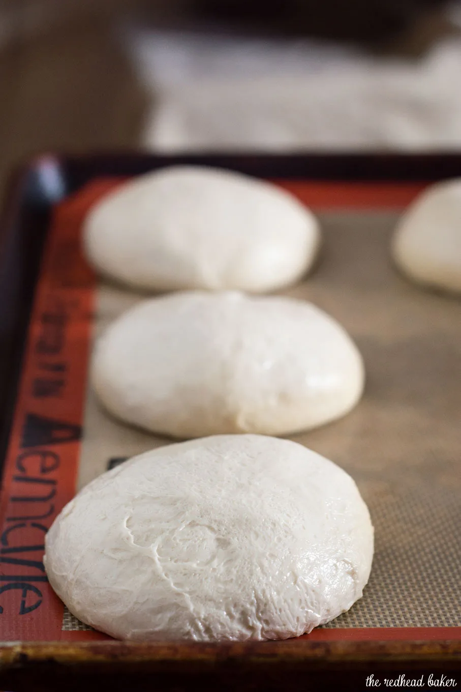 Crusty French rolls get their texture from a long rise in the refrigerator. Make them small to serve with dinner, or larger to hold a sandwich or burger.