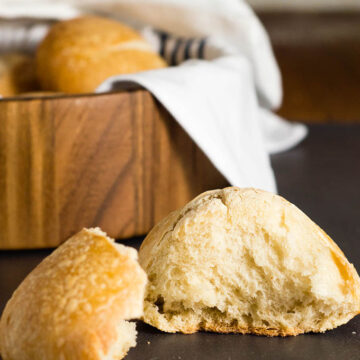 Crusty French rolls get their texture from a long rise in the refrigerator. Make them small to serve with dinner, or larger to hold a sandwich or burger.