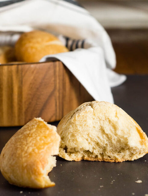 Crusty French rolls get their texture from a long rise in the refrigerator. Make them small to serve with dinner, or larger to hold a sandwich or burger.