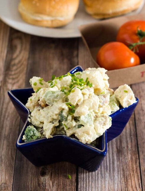 This isn't your mom's potato salad. It's loaded potato salad, with bacon, broccoli and cheddar — all the best parts of a loaded baked potato in a cool summer side dish. #ProgressiveEats