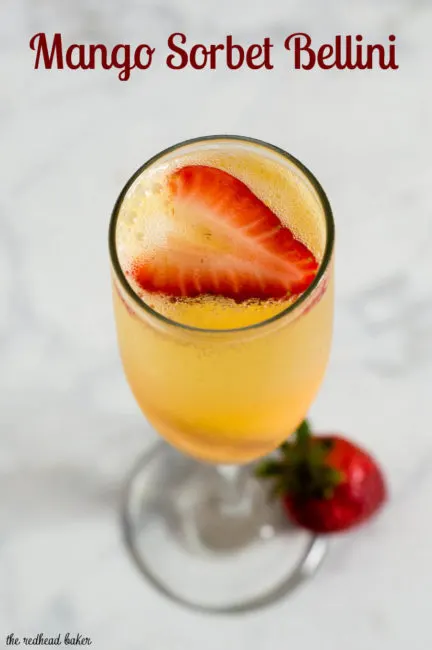 Mango sorbet bellinis are made with just two ingredients, but using sorbet makes them just a little extra special. Top off with a fresh strawberry slice. #BrunchWeek