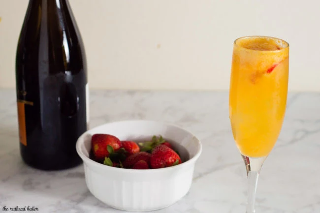 Mango sorbet bellinis are made with just two ingredients, but using sorbet makes them just a little extra special. Top off with a fresh strawberry slice. #BrunchWeek