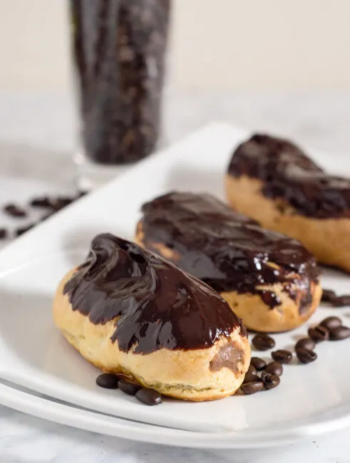 Mocha eclairs are filled with pastry cream flavored with chocolate and coffee extract &mdash; what better pastry to serve at a brunch? #BrunchWeek