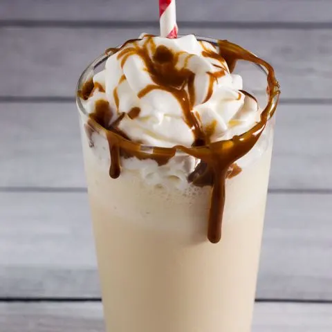 This caramel apple milkshake is a simple and delicious treat of blended vanilla ice cream, apple cider and caramel sauce.