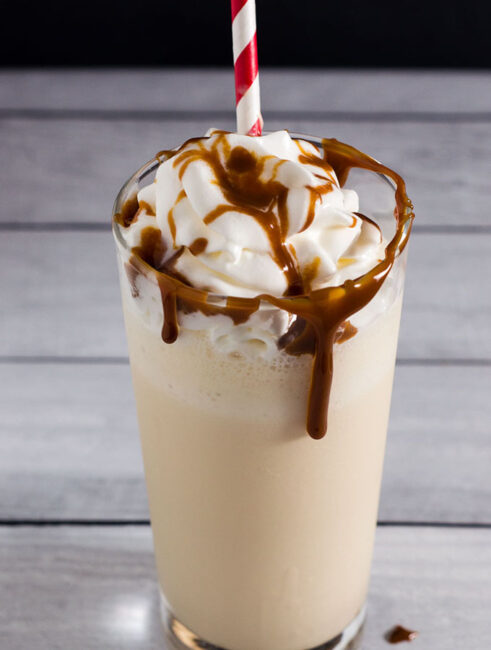 This caramel apple milkshake is a simple and delicious treat of blended vanilla ice cream, apple cider and caramel sauce.