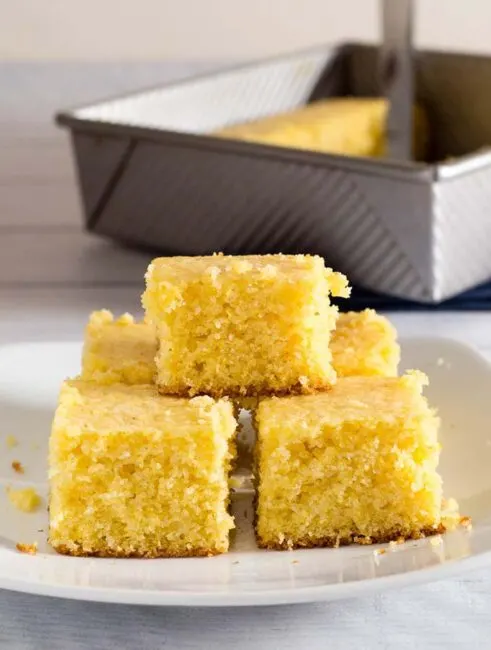 Sweet cornbread is a classic cookout side dish. This recipe is buttery and moist, all that's needed is a drizzle of honey! #CookoutWeek
