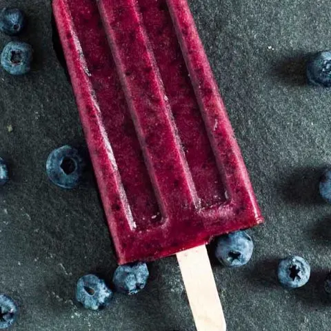 With just four ingredients, these simple frozen blueberry pops deliver intense blueberry flavor. They're perfect for cooling off on a hot summer day!