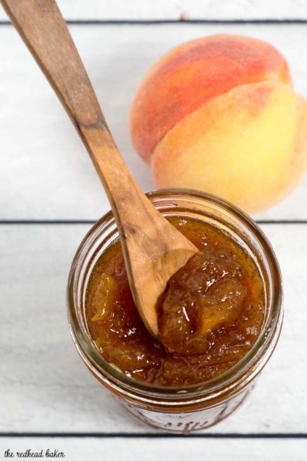 Peach vanilla jam sweetened with honey is canned using the waterbath method (no pectin needed!), so you can have a taste of summer all year long! 