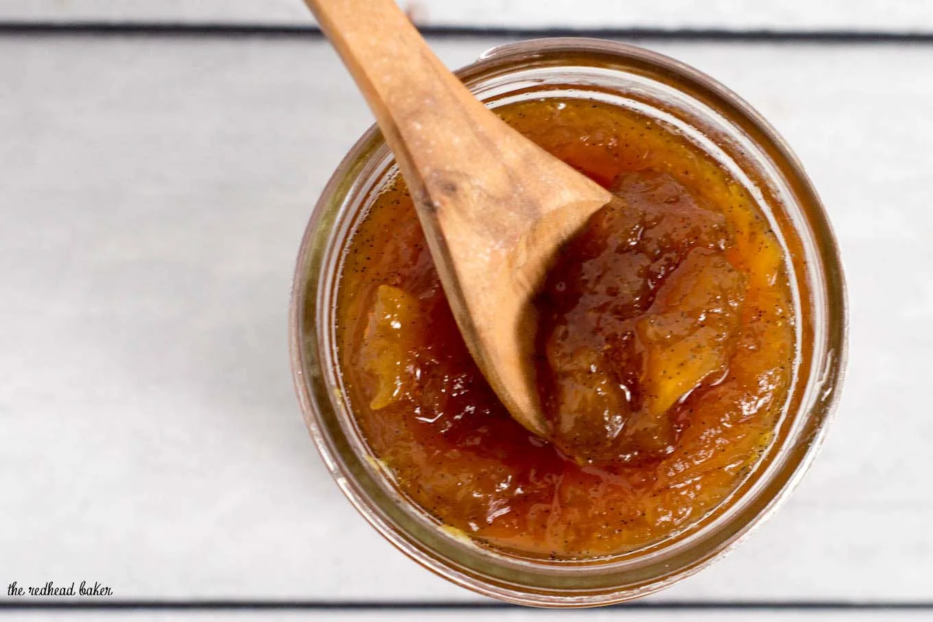 Peach vanilla jam sweetened with honey is canned using the waterbath method (no pectin needed!), so you can have a taste of summer all year long! 