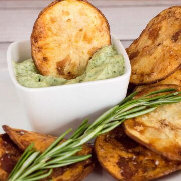 Rosemary potato chips: you can't get this flavor in a bag of store-bought chips! Dunk these crispy chips in a dip of fresh herb aioli for even more flavor. #ProgressiveEats