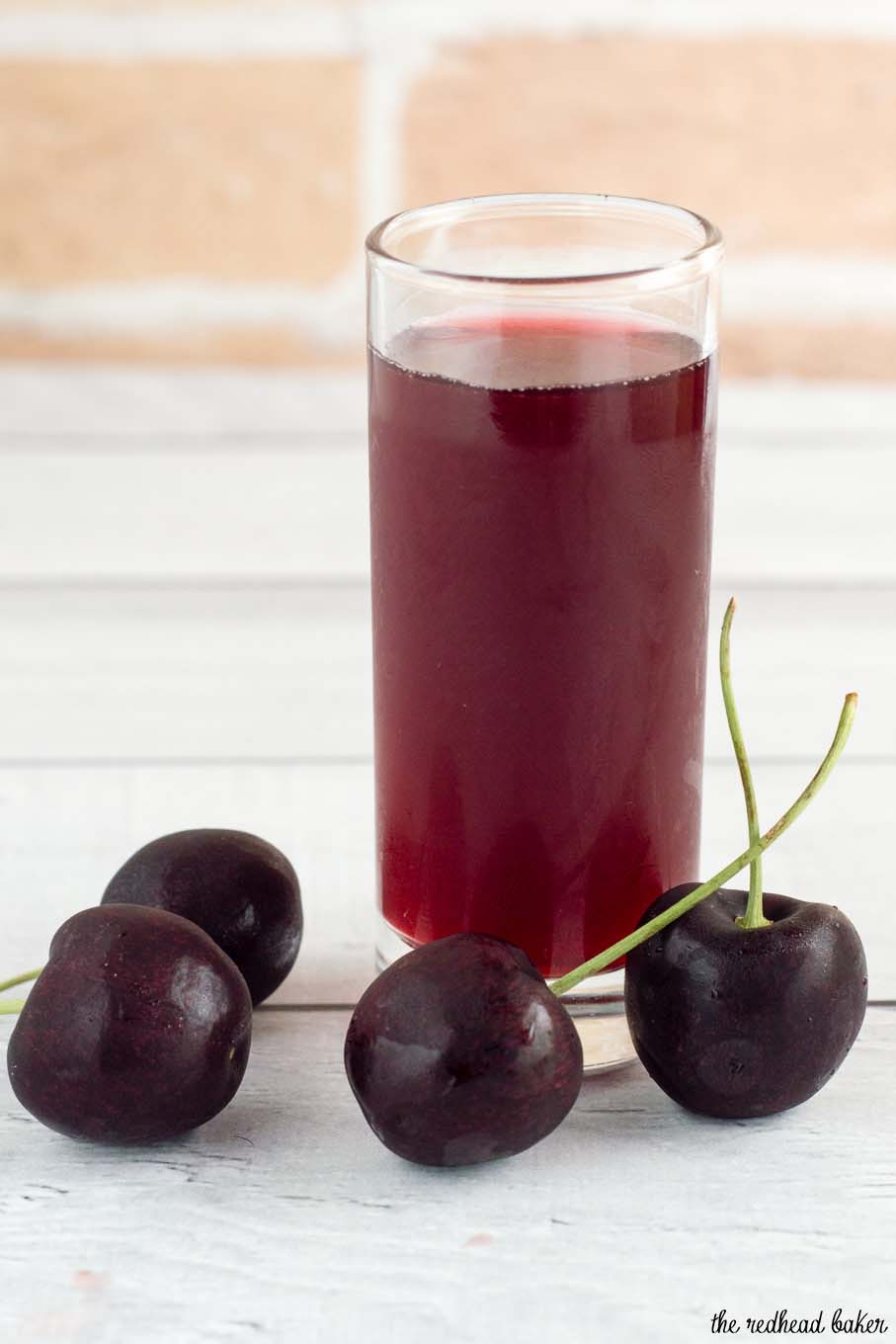 A cherry shrub is a fruit syrup preserved with vinegar, dating back to Colonial America. It can be used to make refreshing cocktails.