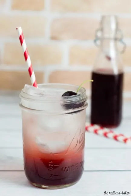 A cherry shrub is a fruit syrup preserved with vinegar, dating back to Colonial America. It can be used to make refreshing cocktails.