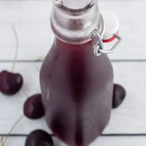 A cherry shrub is a fruit syrup preserved with vinegar, dating back to Colonial America. It can be used to make refreshing cocktails.