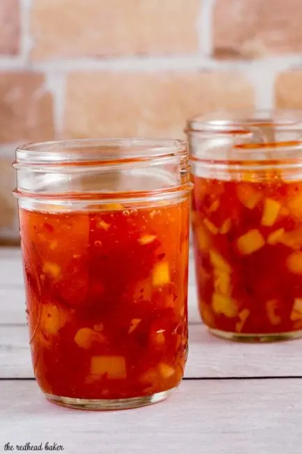 This sticky, sweet mango chili sauce is easy to make and so addictive! Use it to dip shrimp, chicken or fresh spring rolls.&nbsp;