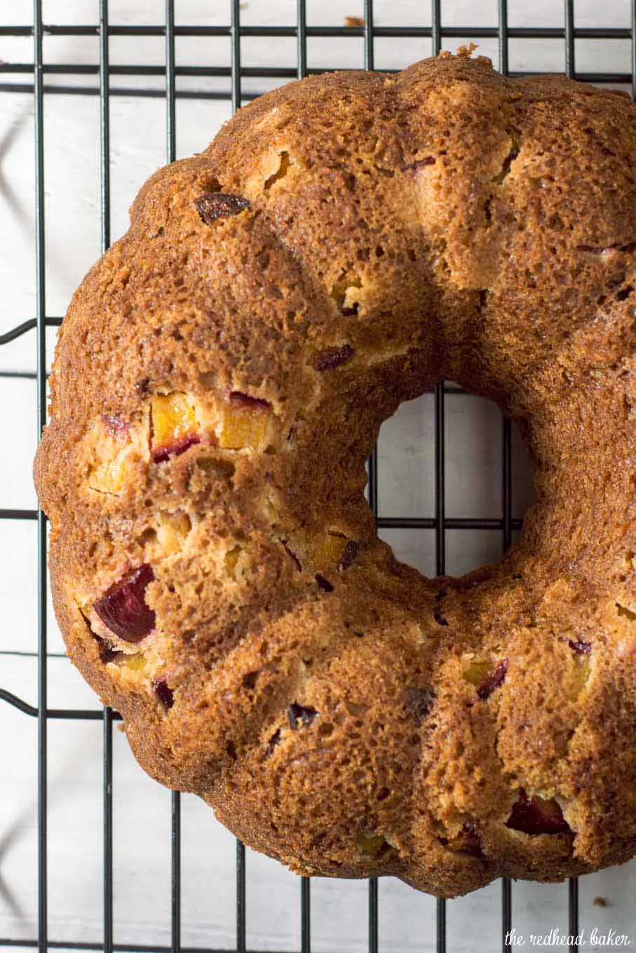 Flavorful vanilla bean bourbon plum bundt cake is flavored with plums mascerated in bourbon and sugar — it's the perfect way to end summer! #ProgressiveEats