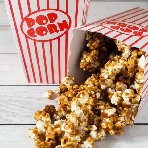 It's so easy to make your own buttery sweet caramel corn at home! This oldie-but-goodie snack will be a hit at any party.