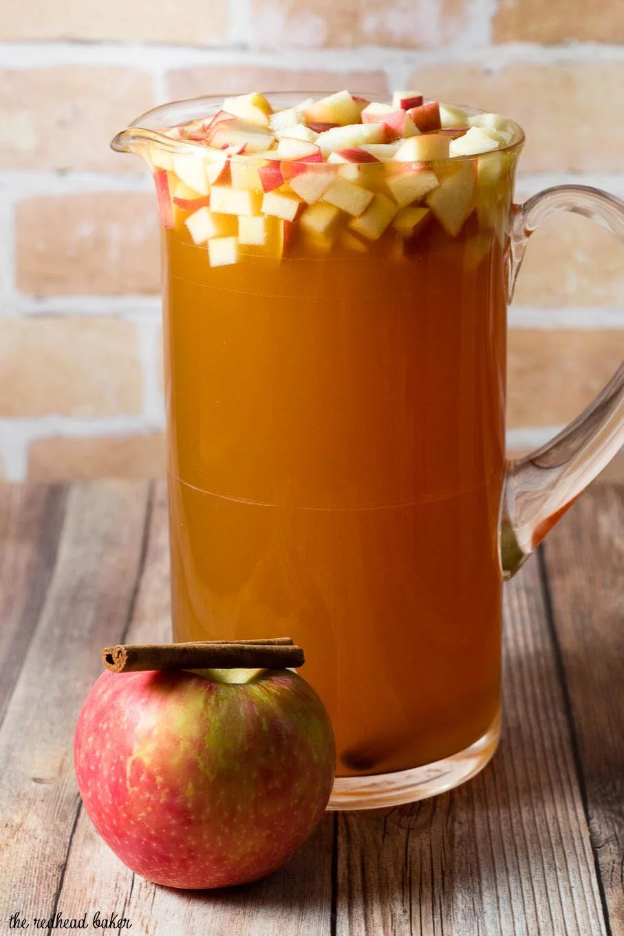 Cinnamon apple cider sangria is a delicious fall cocktail combining white wine, apple cider, apple brandy and cinnamon whiskey. #AppleWeek