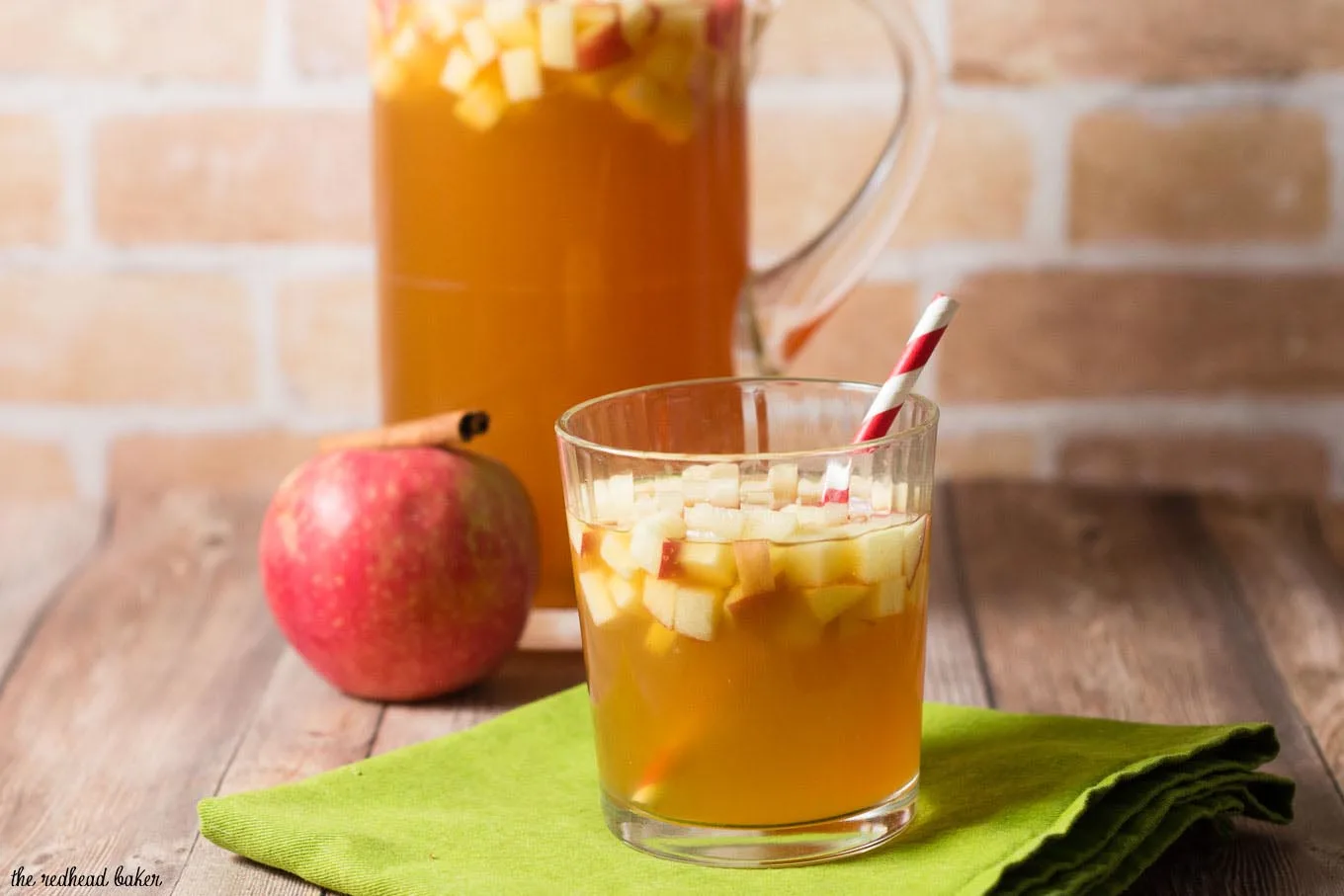 Cinnamon apple cider sangria is a delicious fall cocktail combining white wine, apple cider, apple brandy and cinnamon whiskey. #AppleWeek