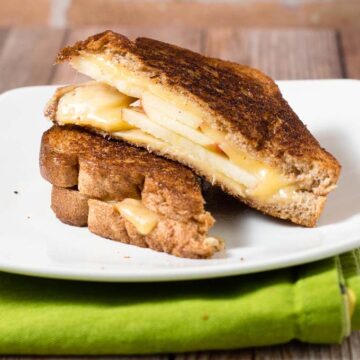 Thinly sliced honeycrisp apples add a sweet twist to classic grilled cheese. They are paired here with gouda, but cheddar would be delicious, too. #AppleWeek