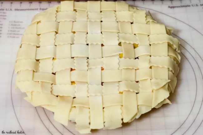 One slice of this mango peach pie is a tropical treat! Chunks of fresh fruit are lightly spiced with cinnamon, ginger and nutmeg.&nbsp; #OXOGoodCookies #BakeADifference