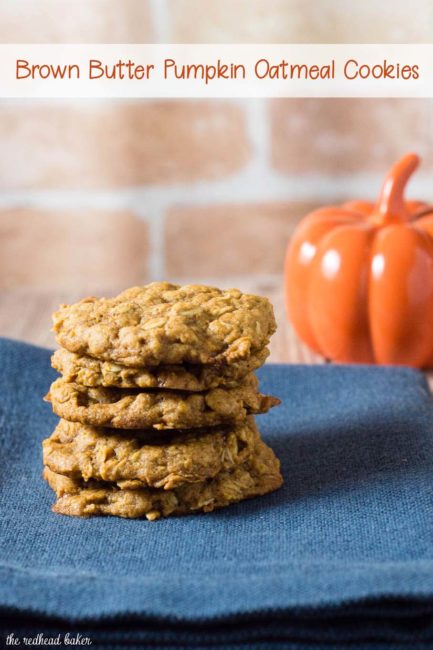 These chewy pumpkin oatmeal cookies are flavored with spices and nutty browned butter, and are loaded with caramel chips.  #PumpkinWeek