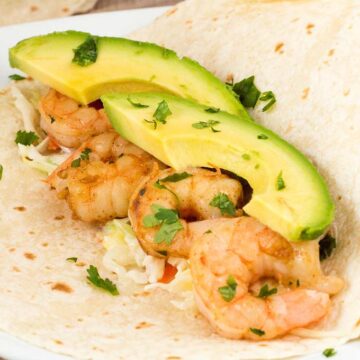 With a touch of avocado and pineapple slaw for some sweetness, these chipotle lime shrimp tacos are the perfect combination of spicy and fruity!