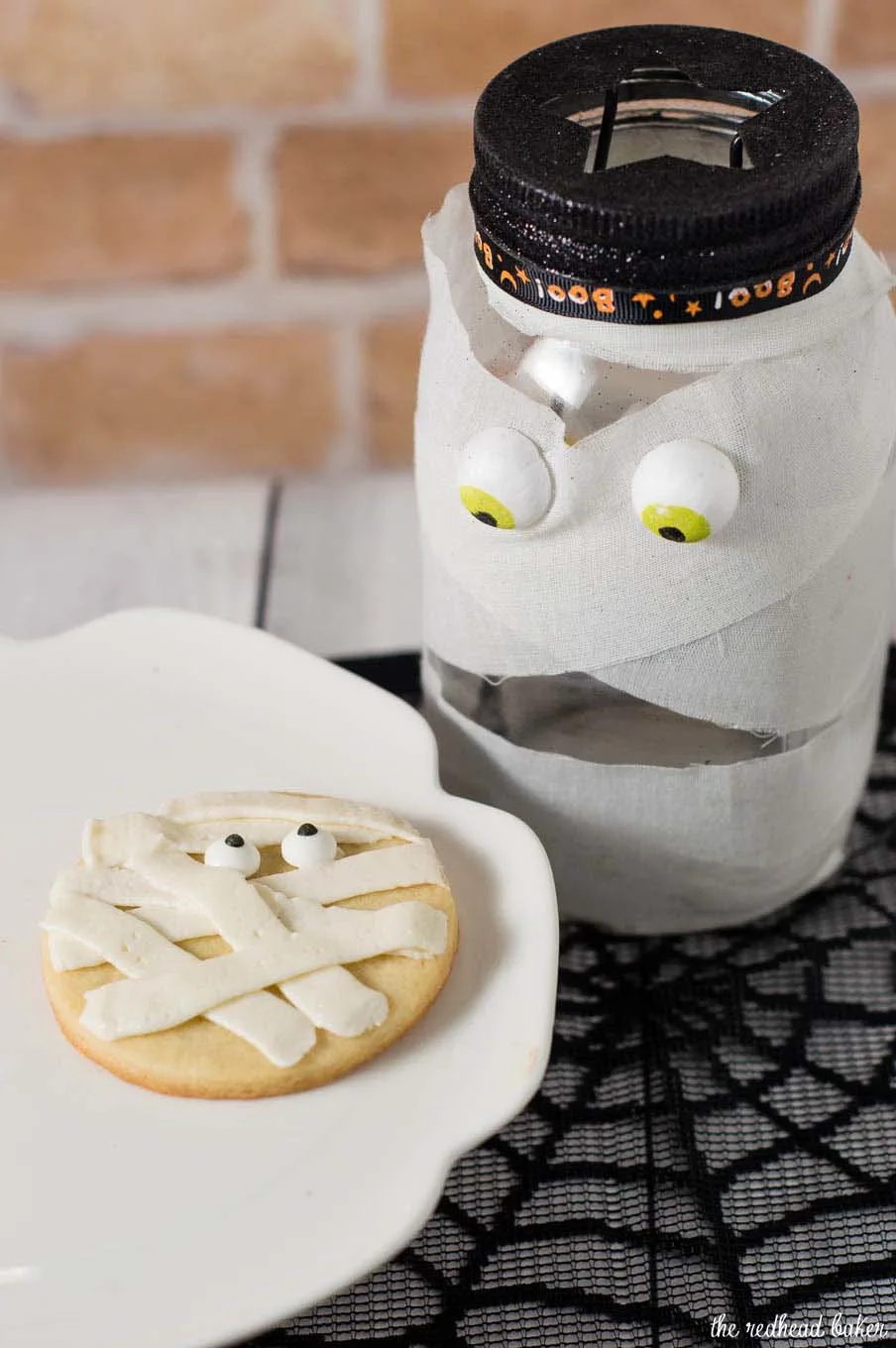 Scare up some easy Halloween treats — make these spooky mummy cookies. Simply pipe a few lines of frosting onto round sugar cookies, add candy eyes and you're done! #ProgressiveEats