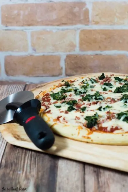 October is National Pizza Month, but this spinach, pancetta and fontina pizza can be enjoyed all year round.&nbsp;