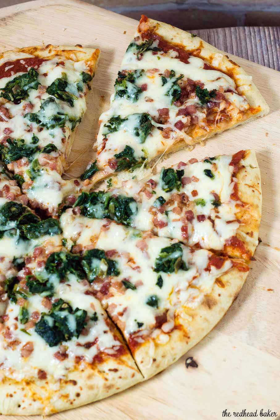 October is National Pizza Month, but this spinach, pancetta and fontina pizza can be enjoyed all year round. 
