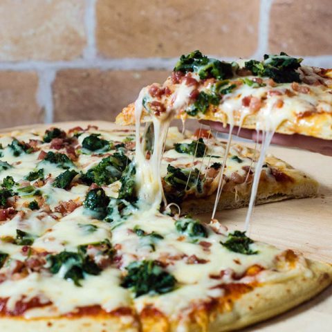 October is National Pizza Month, but this spinach, pancetta and fontina pizza can be enjoyed all year round. 