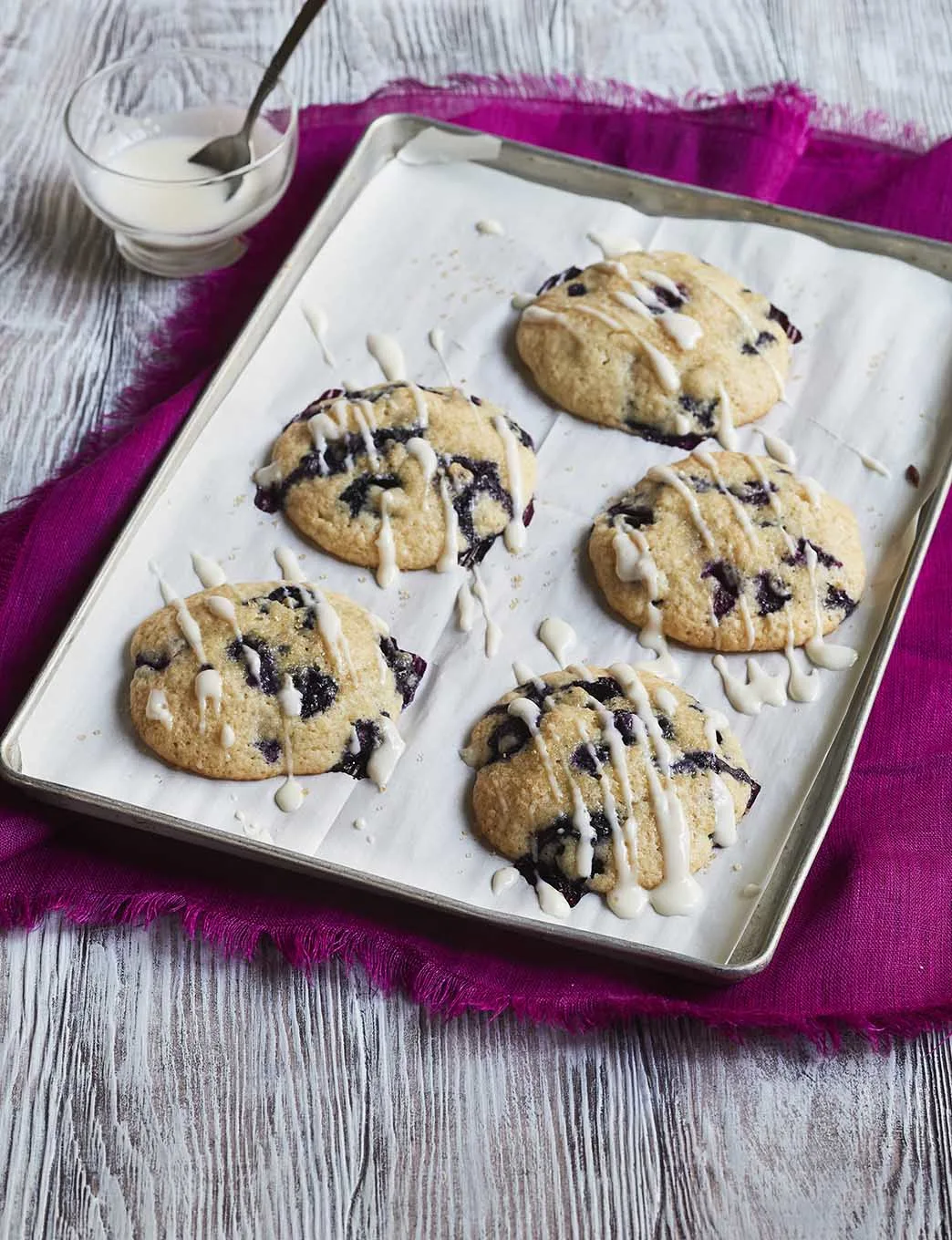 Lisa Huff of Snappy Gourmet has published a cookbook for kids ages 8 to 13, including these blueberry muffin tops with cheesecake drizzle.