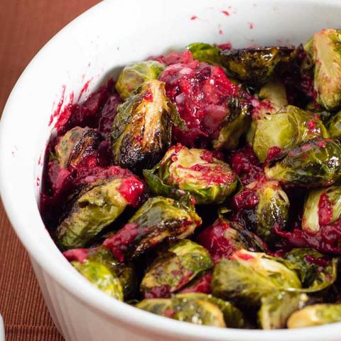 Roasted brussels sprouts are tender and sweet, and tossing them with a cranberry brown butter sauce adds a savory-sweet flavor.
