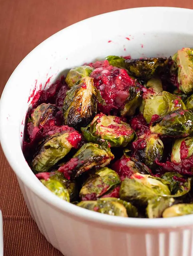 Roasted brussels sprouts are tender and sweet, and tossing them with a cranberry brown butter sauce adds a savory-sweet flavor.