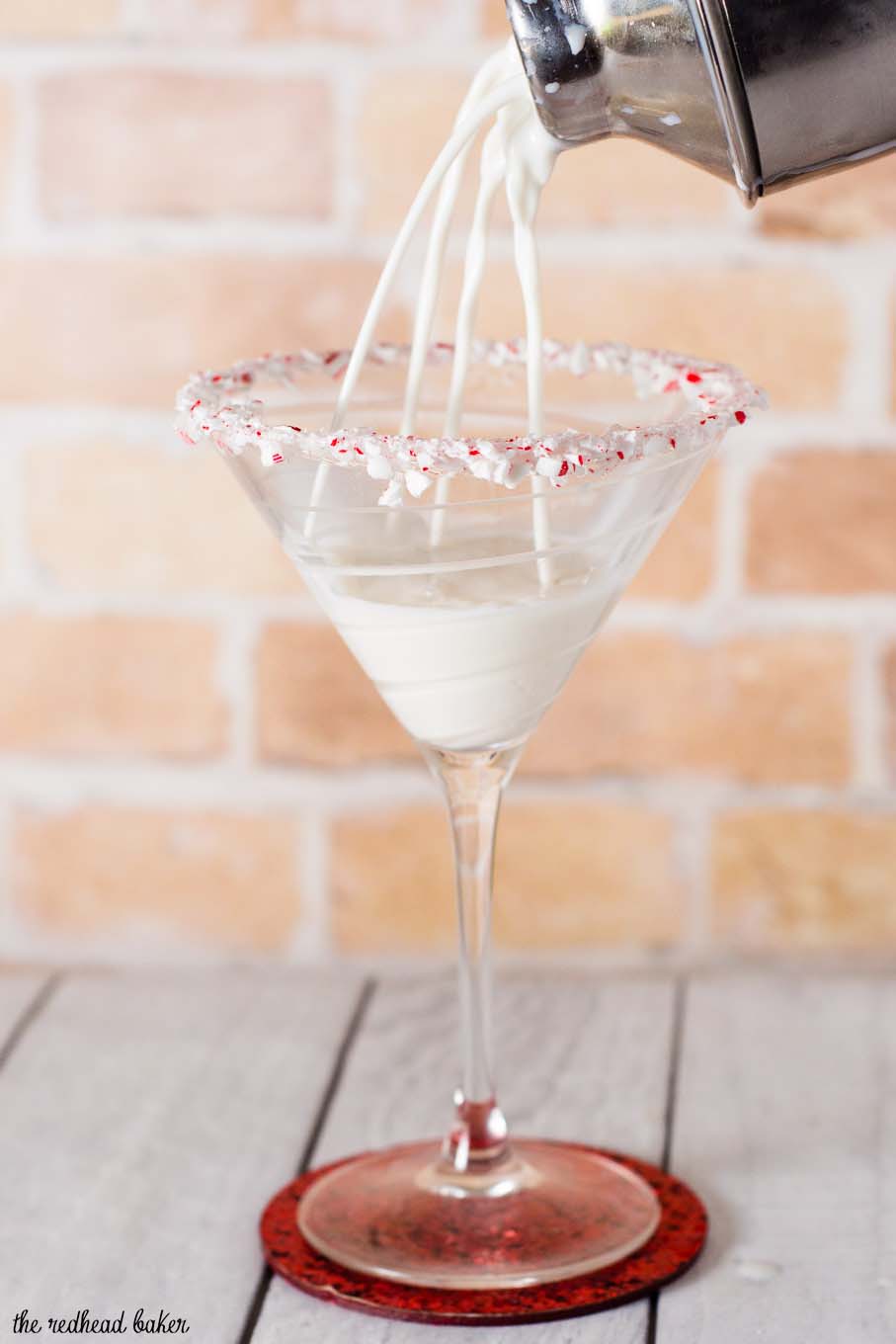 It doesn't get more festive than a candy cane martini for the holidays! Shake up a batch of this creamy cocktail for your holiday party. #ProgressiveEats