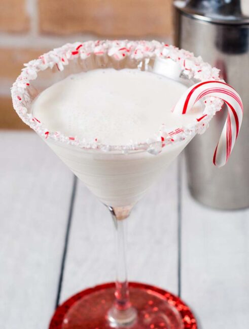 It doesn't get more festive than a candy cane martini for the holidays! Shake up a batch of this creamy cocktail for your holiday party. #ProgressiveEats