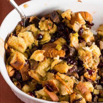 Cranberry Chestnut Brioche Stuffing is a flavorful side dish for your Thanksgiving table. Rich brioche bread is dotted with cranberries and chestnuts.