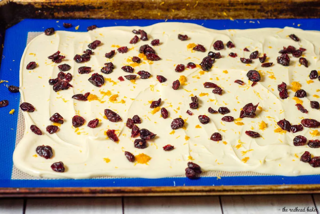 Have a lot of holiday parties to attend? Homemade cranberry-orange bark gives your wallet a break, and provides your hostess with a delicious treat. #FoodGifts