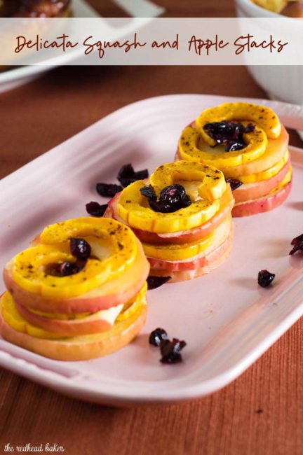 Delicata squash and apple stacks are a unique way to enjoy this fall produce. Seasoned with cinnamon and thyme, they blend sweet and savory flavors.
