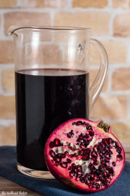 Spiced pomegranate red wine punch is a delicious cocktail for holidays and average days alike. Serve it warm or cold, garnished with a twist of orange rind. 