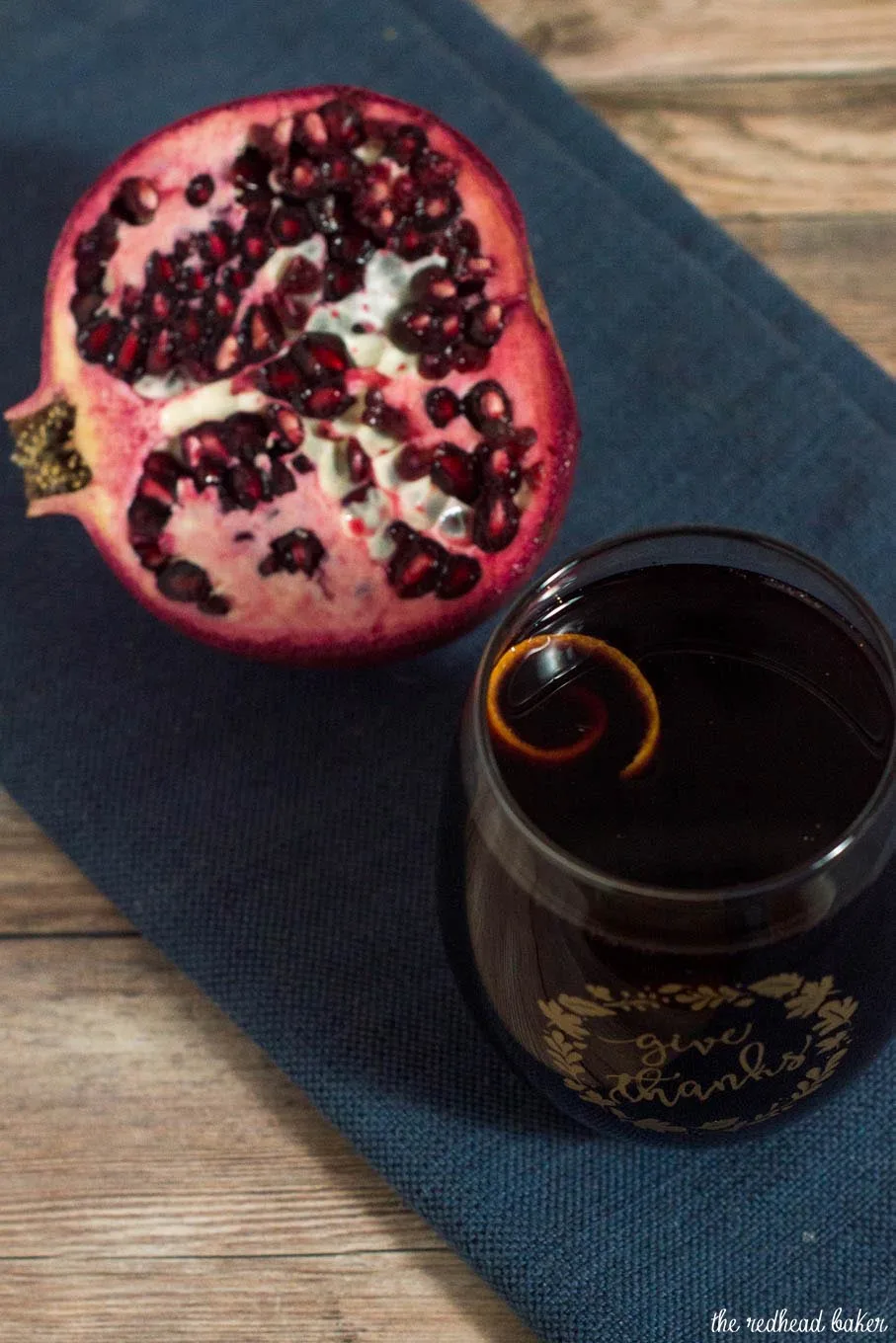 Spiced pomegranate red wine punch is a delicious cocktail for holidays and average days alike. Serve it warm or cold, garnished with a twist of orange rind. 