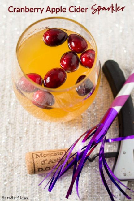 Ring in the new year with this cranberry apple cider sparkler, a cocktail that combine sparkling wine with the winter flavors of apple and cranberry. #CocktailParty