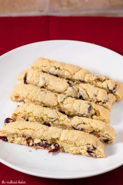 'Tis the season for cranberry eggnog biscotti! These crunchy, sweet cookies are loaded with sweet-tart dried cranberries. #ChristmasCookies