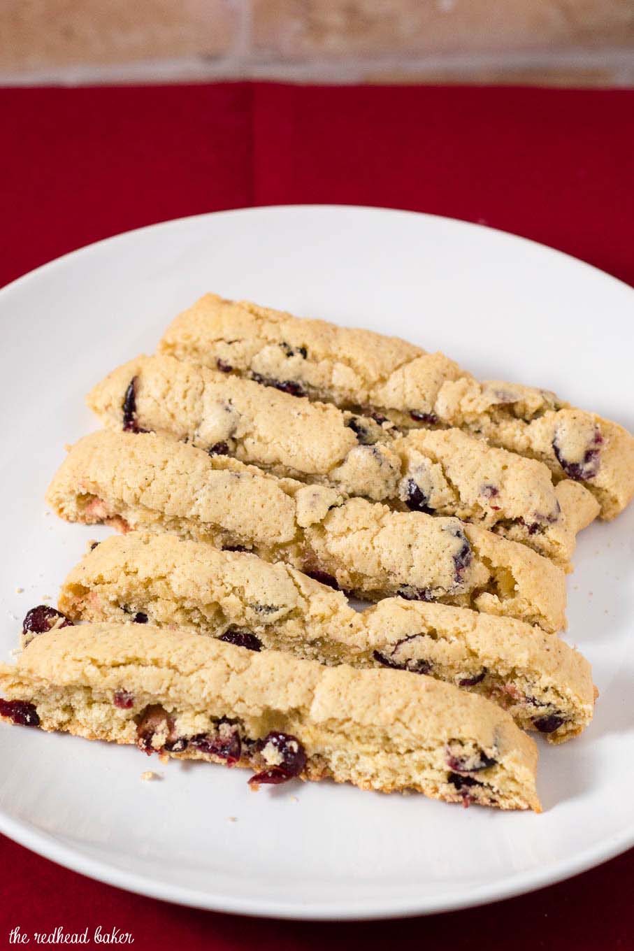 'Tis the season for cranberry eggnog biscotti! These crunchy, sweet cookies are loaded with sweet-tart dried cranberries. #ChristmasCookies