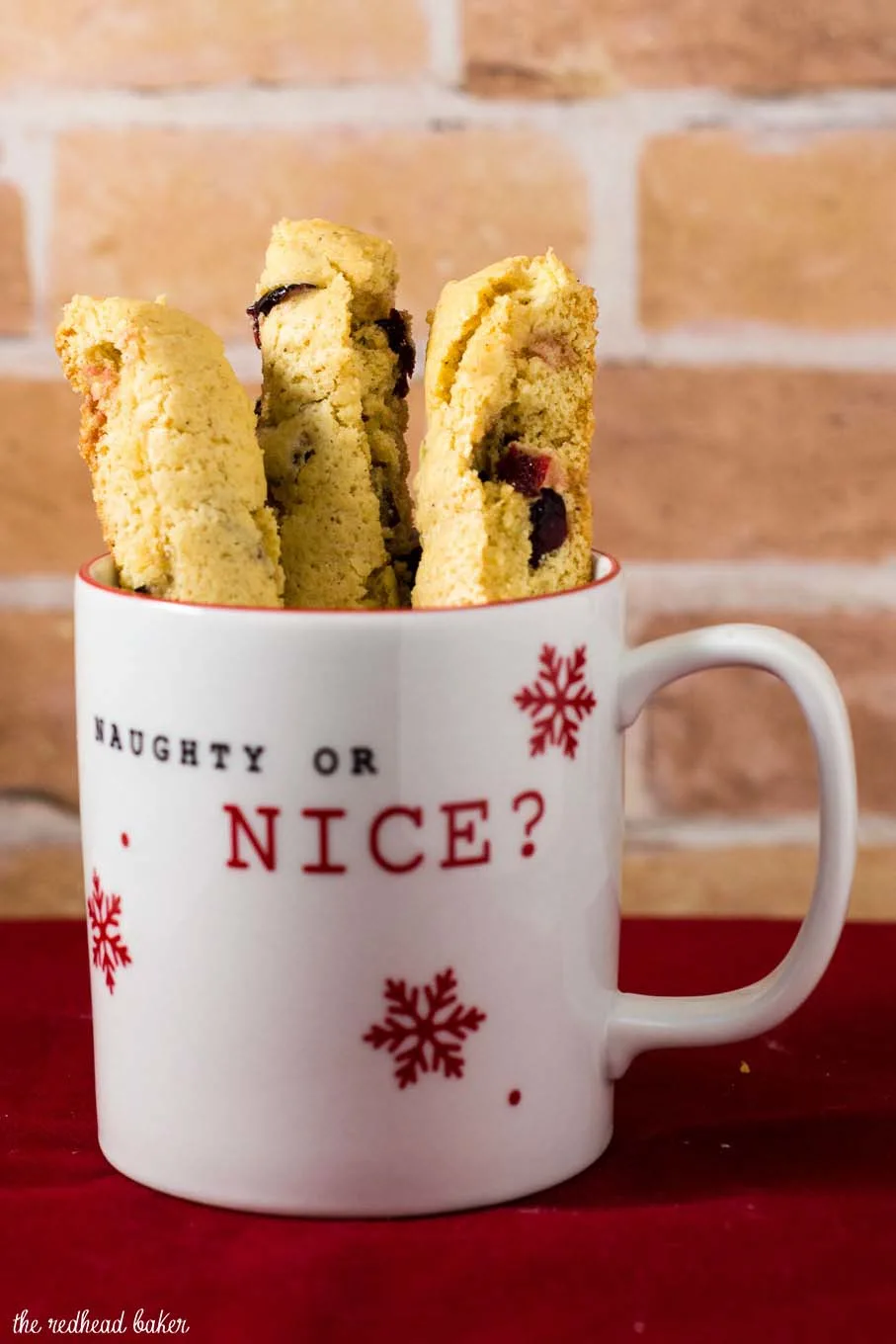 'Tis the season for cranberry eggnog biscotti! These crunchy, sweet cookies are loaded with sweet-tart dried cranberries. #ChristmasCookies