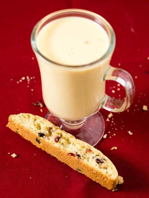 'Tis the season for cranberry eggnog biscotti! These crunchy, sweet cookies are loaded with sweet-tart dried cranberries. #ChristmasCookies