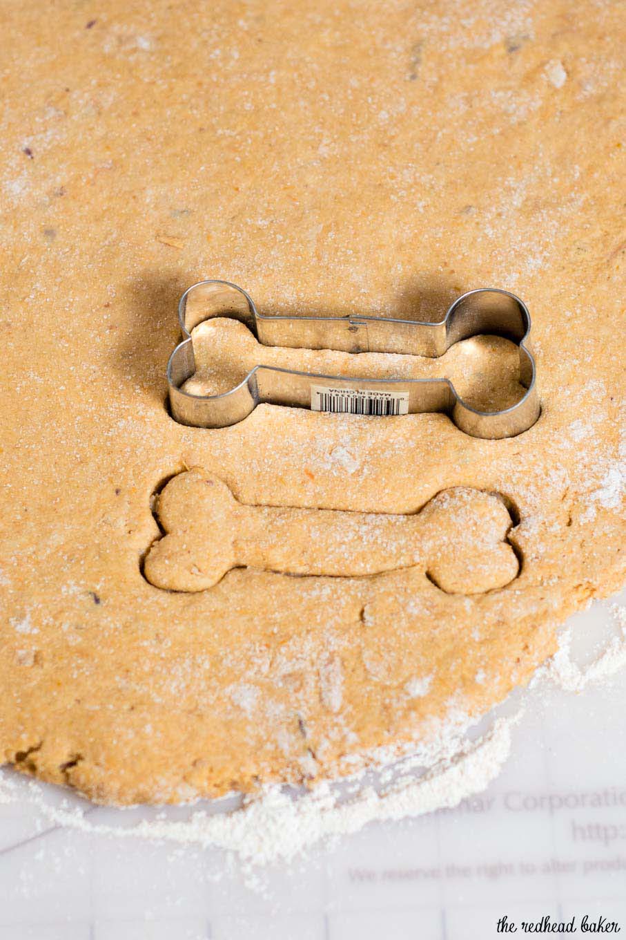 Pumpkin apple dog biscuits are a healthy, crunchy treat for your furry friend. Substitute almond flour for the wheat flour if your dog can't have grains.